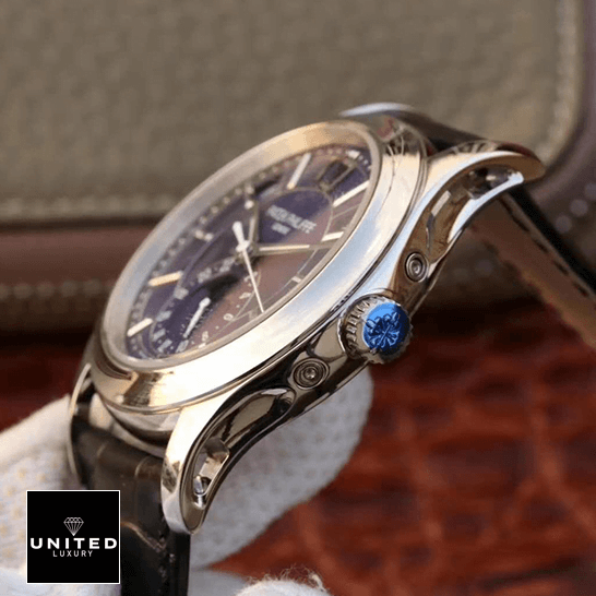 Patek Philippe Annual Calendar 5205G-013 "Blue Dial" Supreme Replica Edition patek philippe complications 5205G 013 replica rightside Patek Philippe Steel Case Blue Dial Replica side view crown